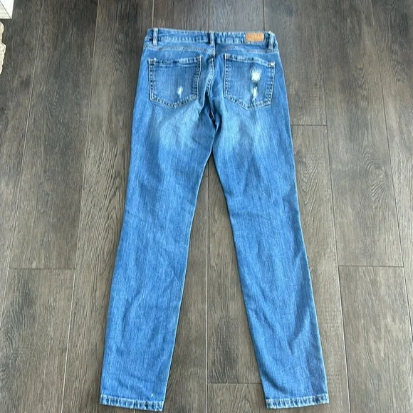 Distressed skinny jeans - Picture 4 of 5